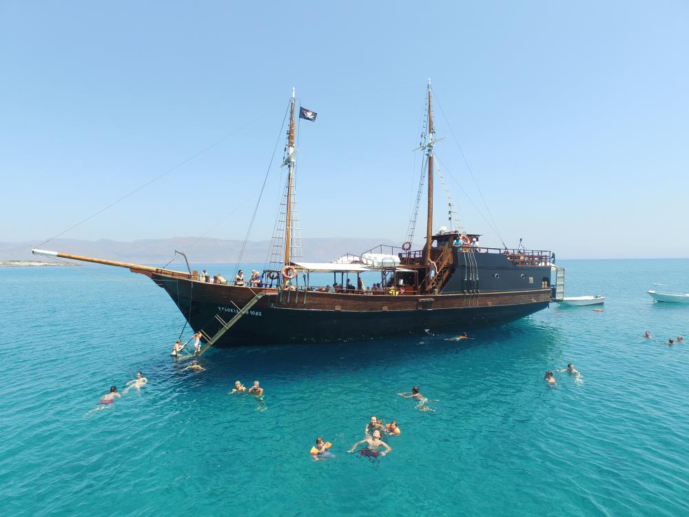 A Pirate ship in turquoise-green waters at Koufonisi in South Crete