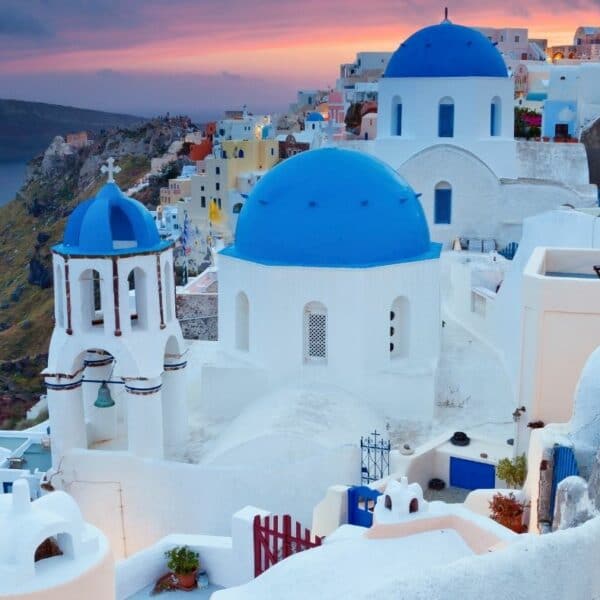 From Crete to Santorini/White churches with blue roofs in Santorini