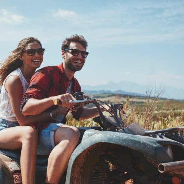 Crete Excursions/A couple sitting on a Quad