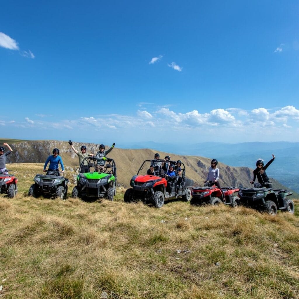 A group of ATV drives high up in the mountains
