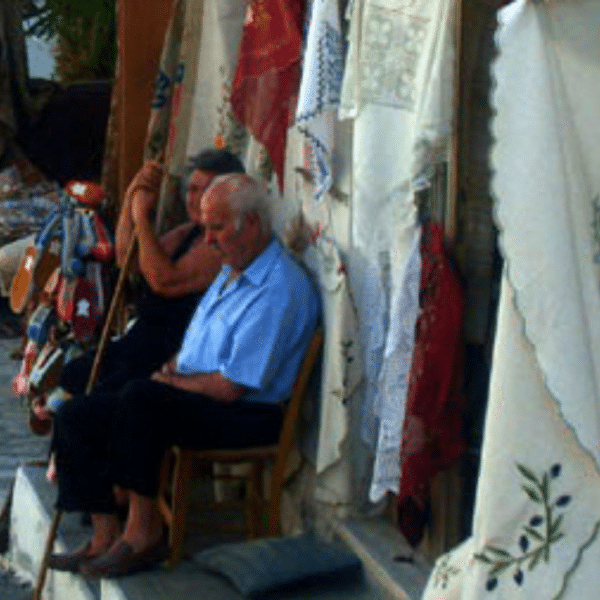 Cretan Villages/ some old men, sittingoutside of a house in an cretan village